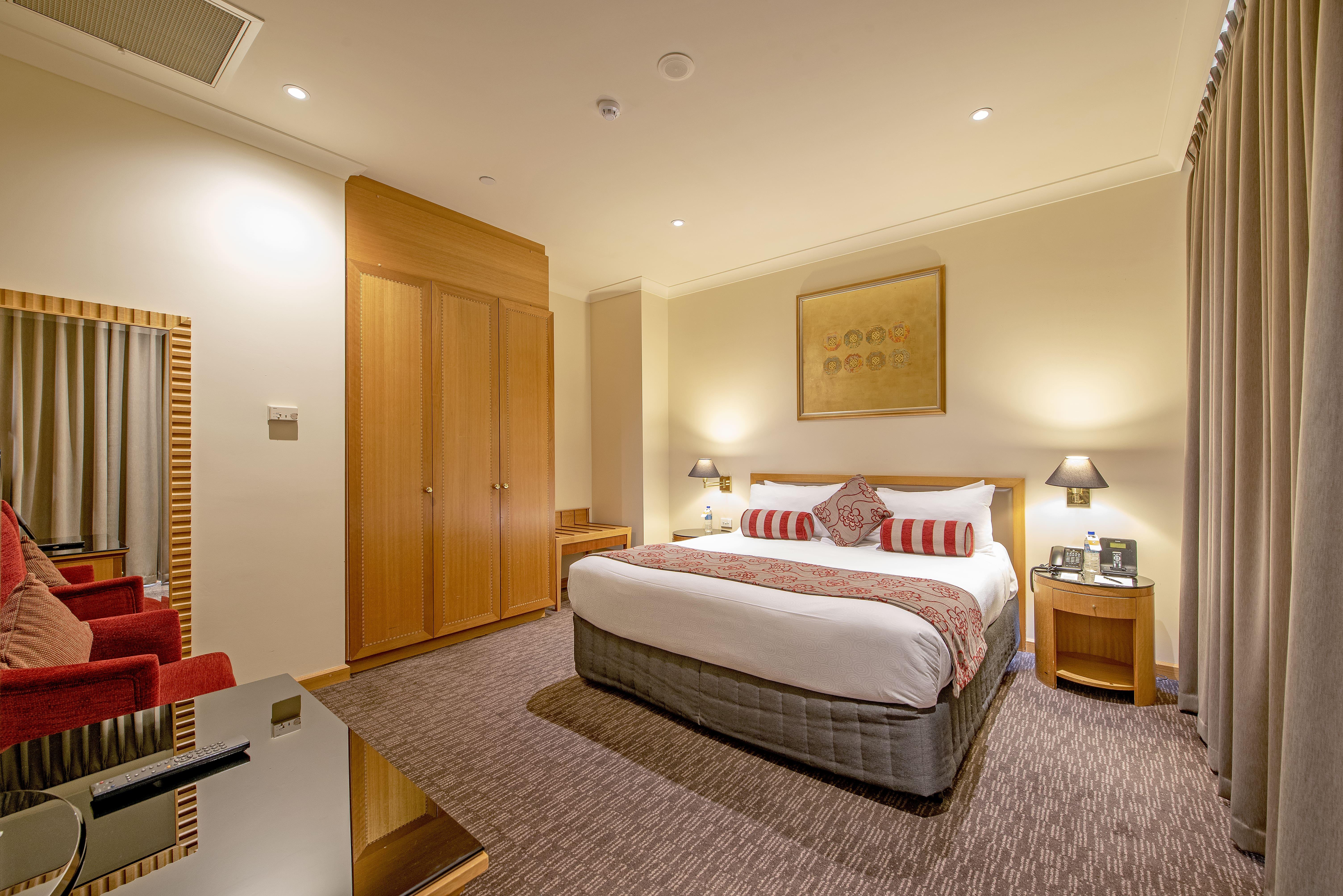 โรงแรมดักซ์ทัน เพิร์ท ภายนอก รูปภาพ A bedroom at the hotel