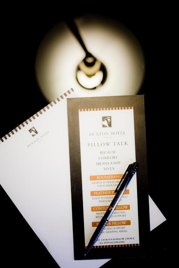 โรงแรมดักซ์ทัน เพิร์ท ภายนอก รูปภาพ A menu at a hotel